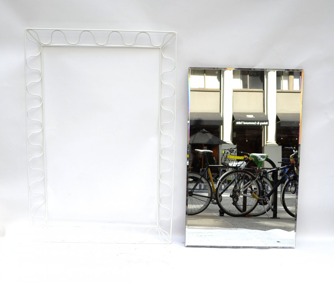 Mirror and Iron Frame: Painted iron wire form frame, mirror beveled. [57" W x 4" D x 38" H]. Overall good condition.