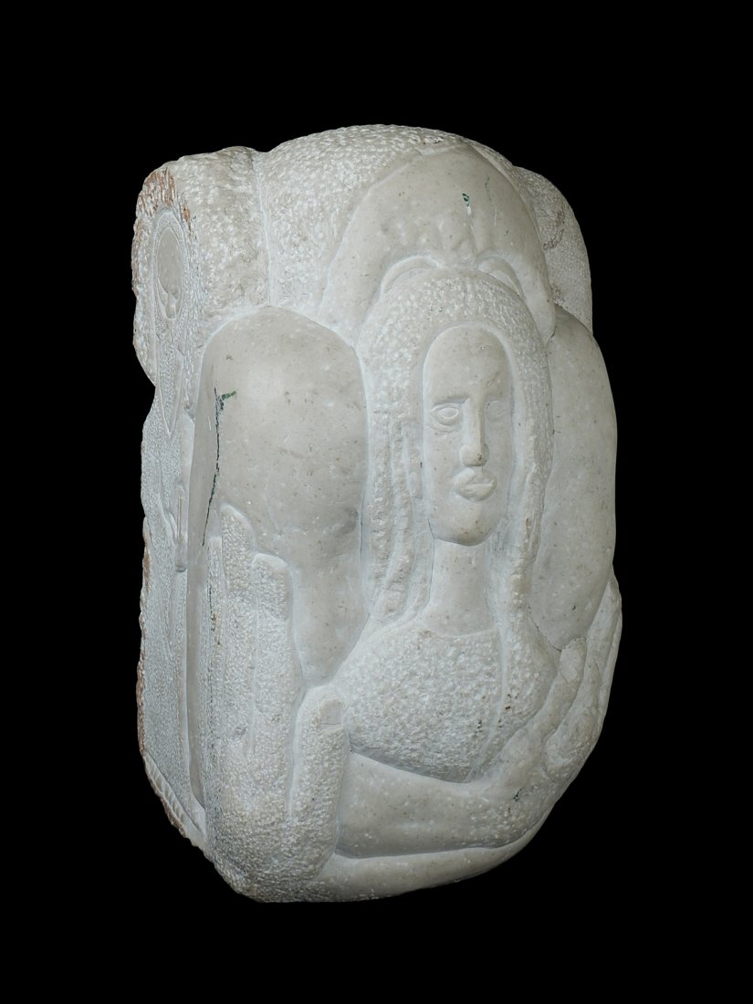 Stone Sculpture with Faces and Figures: Abstract limestone sculpture featuring relief figures and faces. Signed illegibly. [16 1/2" H x 9" x 9"]. Good condition.