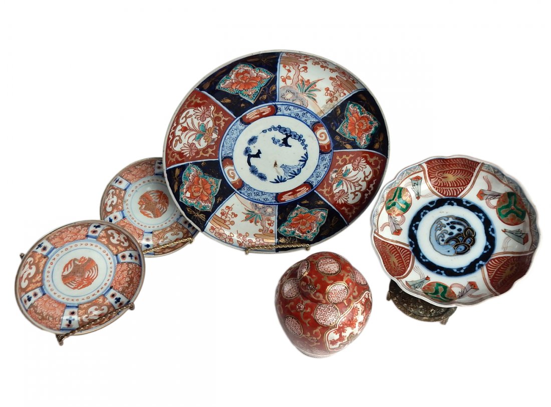 Four Asian Bowls and a Ginger Jar: Four Imari style bowls and one miniature covered ginger jar. [9" dia]. Top repaired on ginger jar. Some minor losses.