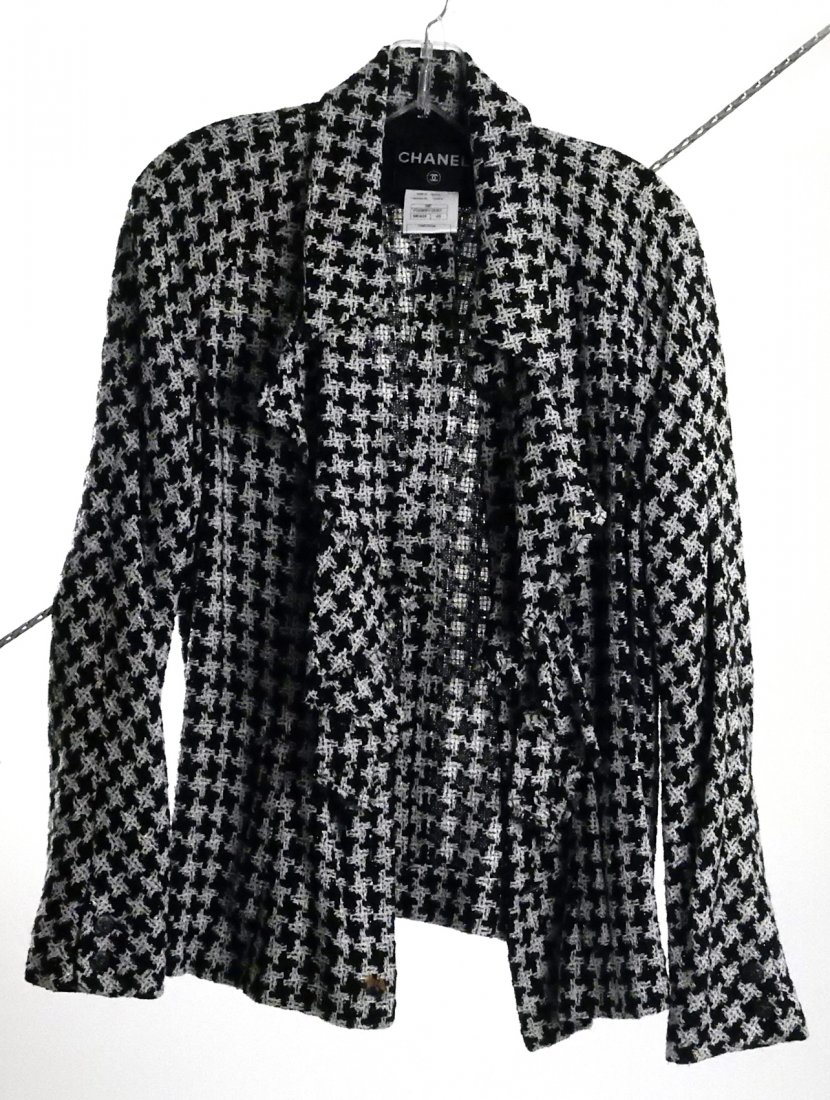 Chanel Ladies Blazer/Coat: Black and white silk with metal buttons bearing Chanel logo. Size 46 (Euro). Good condition.