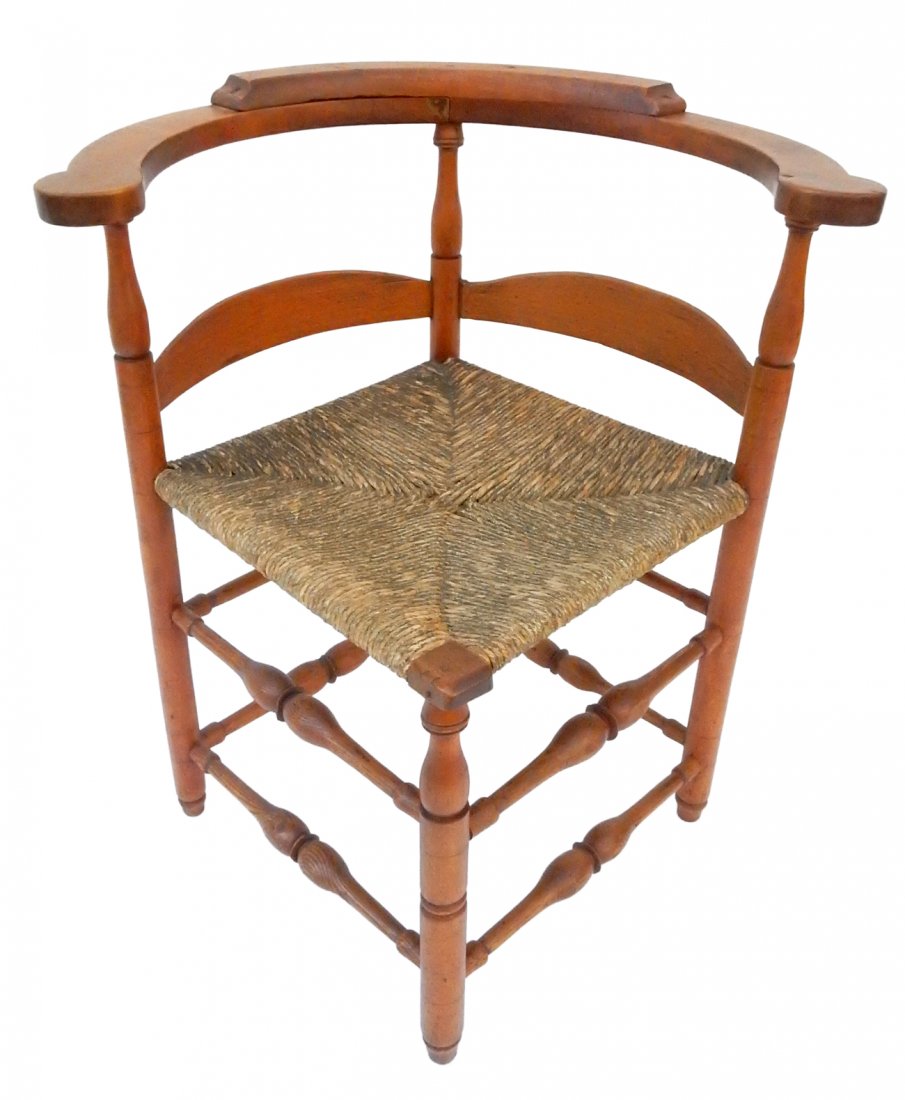 American Rush Seat Corner Chair: Antique cherry wood corner chair. [27" W x 25" D x 31" H]. Good condition as with age.