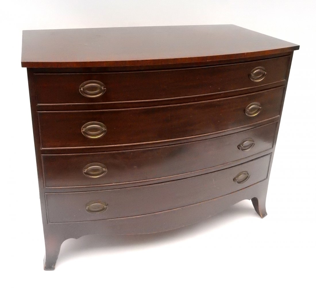 Hepplewhite-Style Bow Front Chest: Hepplewhite-style manhogany bow front chest bearing four drawers. 20th C. American. Good condition.