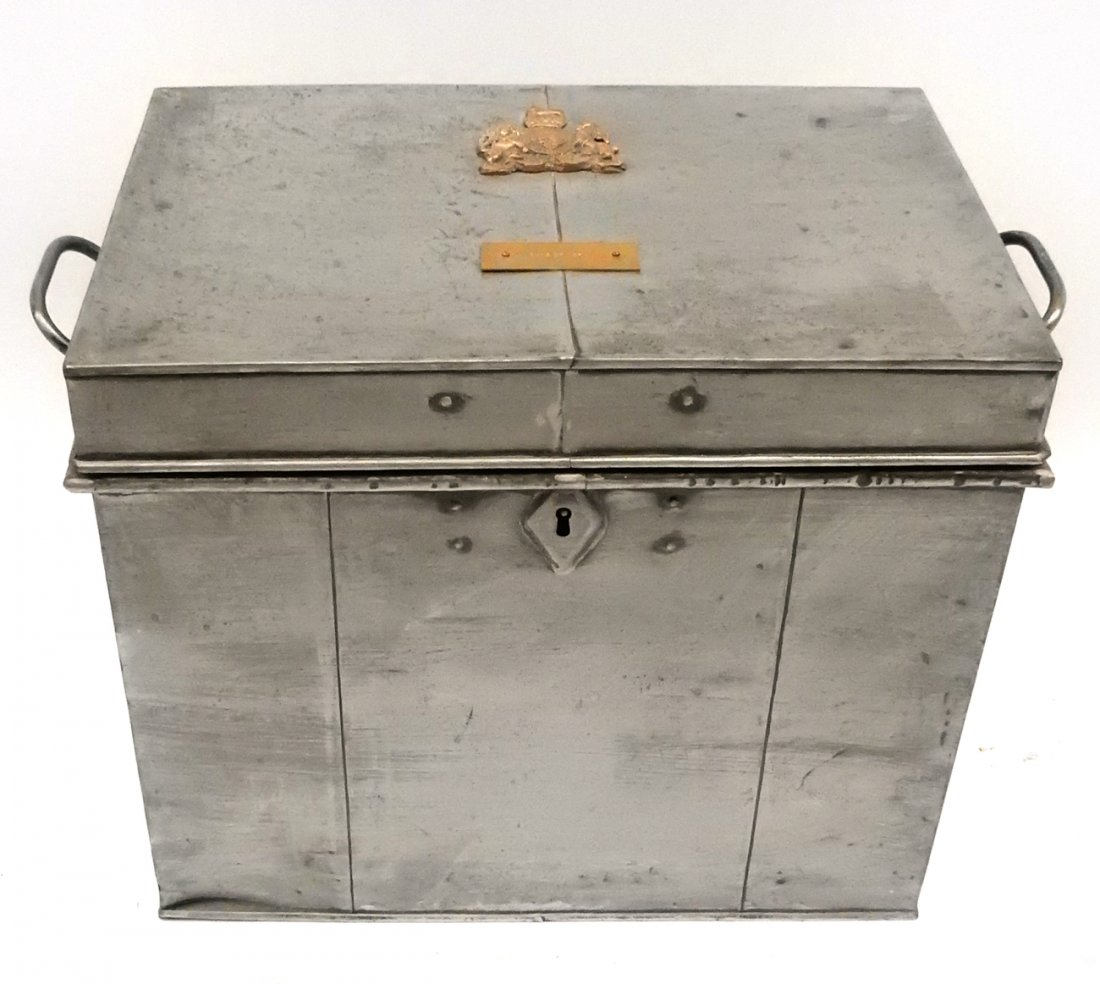 Metal Chest Bearing French Insignia: Metal chest with handles in silver color with bronze French insignia and bronze plaque reading "Duke of York". [20 1/8" x 14 1/8" x 17 1/8"].