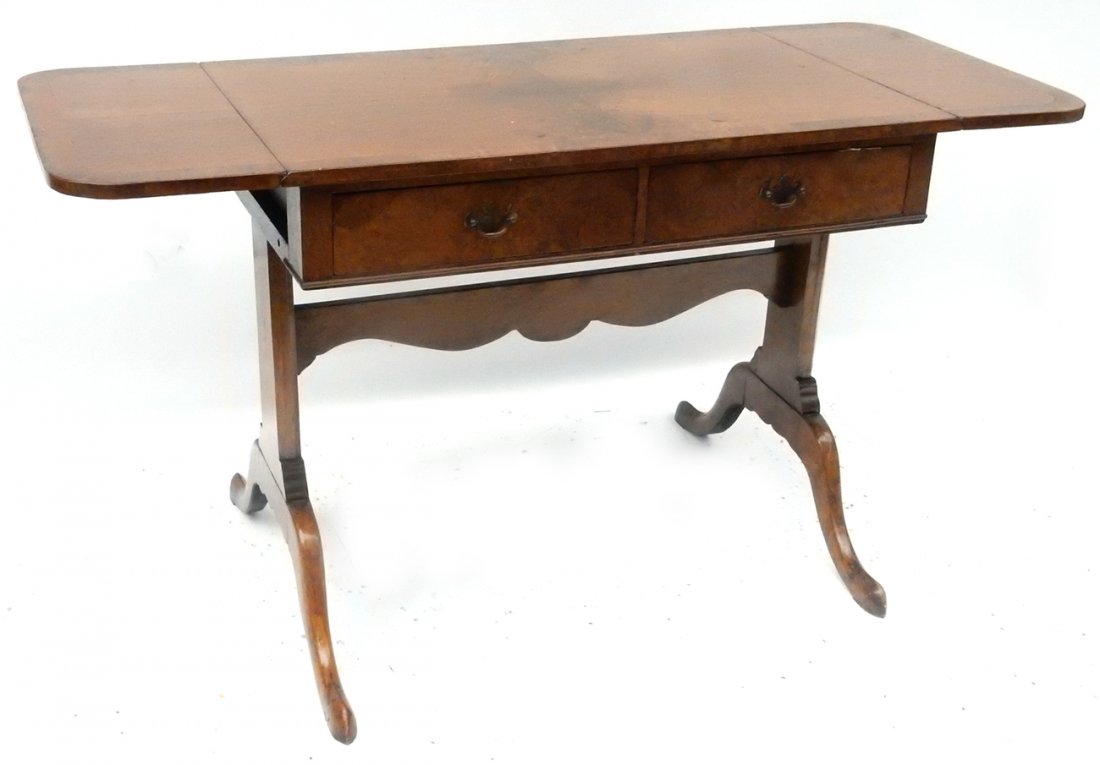 Burled Walnut Side Table: Burl walnut side table with drop leaf table extension on either side and two drawers with brass pulls. [36 1/4" W x 22" D x 29 5/8" H; 55" W fully extended]. Crazing and scuff marks.