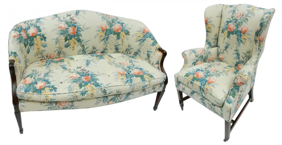 Wing Chair & Settee: Wing chair and settee with English chintz upholstery. [Wing chair: 31" W x 30" D x 33" H; Settee: 51" W x 35" W x 33" H]. Light soiling, good condition.