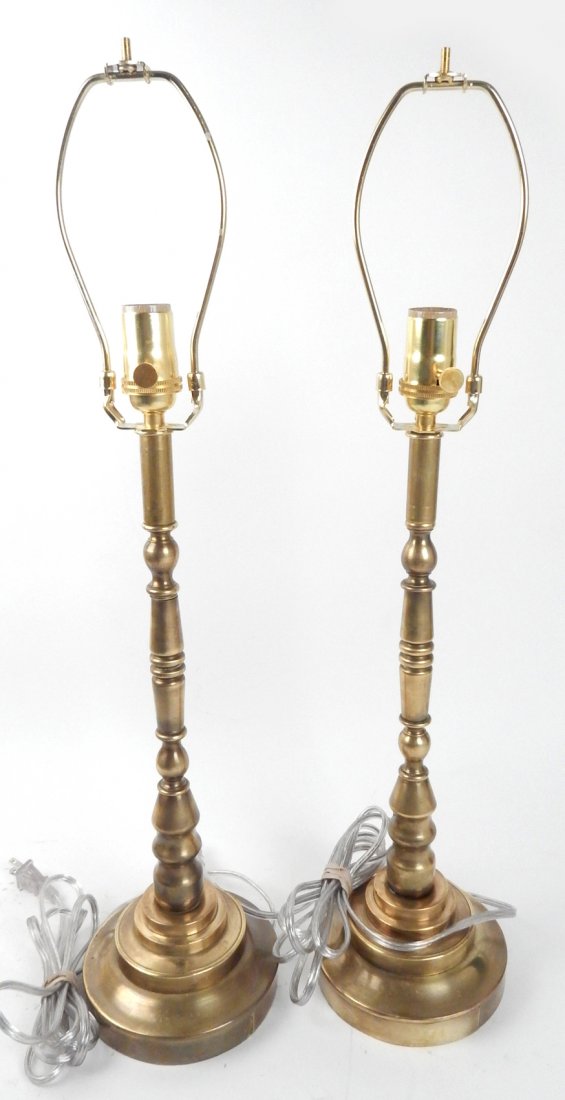 Pair of 1930's Brass Table Lamps: Brass circular stepped base with narrow turned shaft. [6" Dia x 20 1/2" H]. Good condition. From Retro Modern 20th Century Lighting.