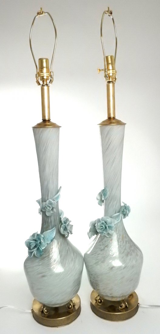Pair 1940s Murano Table Lamps: Vase form Italian art glass lamps with inclusive copper fleck against periwinkle glass body. Lampworked flowers on neck. Brass hardware. [7 1/2" Dia. (shoulders) x 32" H]. Good condition. From Retro M
