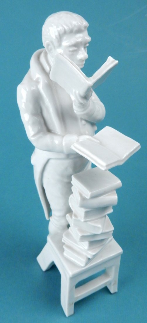 West German Porcelain Figure of Man: Man on a step ladder reading with a stack of books. Marked on bottom "Made in West Germany". [1 7/8" W x 3 7/8" D x 8 1/4" H].