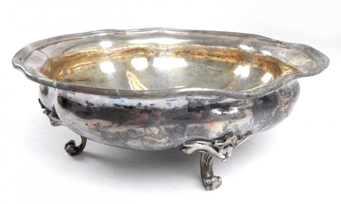 Antique Russian Silver Footed Bowl: 19th Century bowl with undulating rim and grotesque mask feet. [8 3/4\" Dia x 3\" H]. Scuffs and scratches. 17 ozt. (529 g).