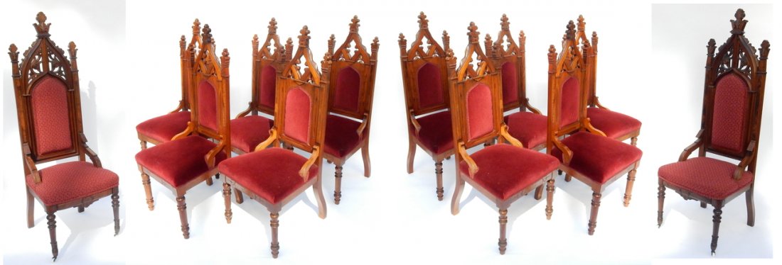 12 Walnut Gothic Revival Dining Chairs: Set of 12 antique walnut Gothic Revival dining chairs. 10 side chairs upholstered in red velvet (backs and seats), and 2 principle chairs upholstered in red patterned fabric. [Principle chairs: 60" H