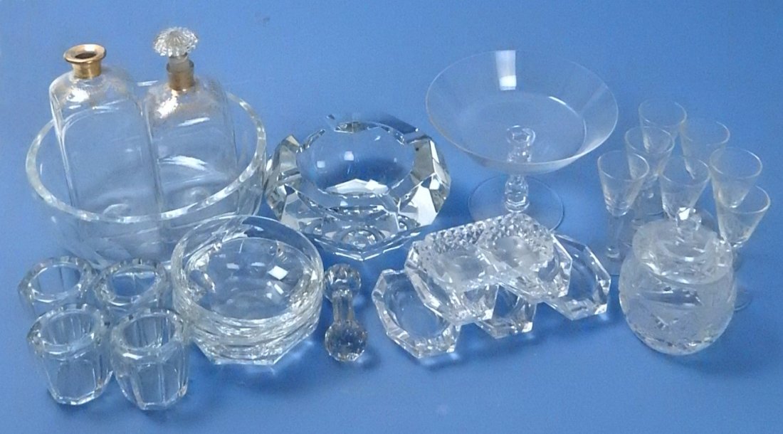 Crystal and Glass: Baccarat, more: Group of crystal and glass including Baccarat, Val St. Lambert and others. Comprises: shot glasses, bowls, decanters [2 7/8" x 2 7/8" x 7"], cordial glasses, and compote. 26 pieces total. [Largest bow