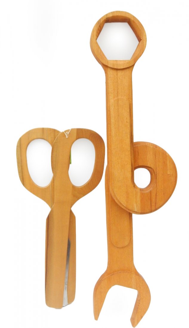 Two Contemporary Wood Tools Sculptures: Oversize wood tools, wrench and scissors. Wrench with twisted center. [Wrench: 48" x 3 1/2" x 14"; Scissors: 30" x 1 1/2" x 13 1/2"]. In good condition.