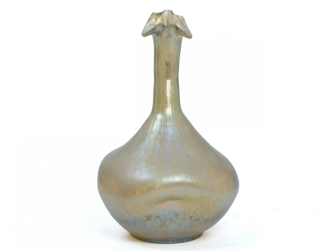 Loetz Dimple Vase: Loetz vase with dimple body, narrow neck, in pale iridescent green and polished pontil. [8 3/4" x 6" W]. Chipped at top.