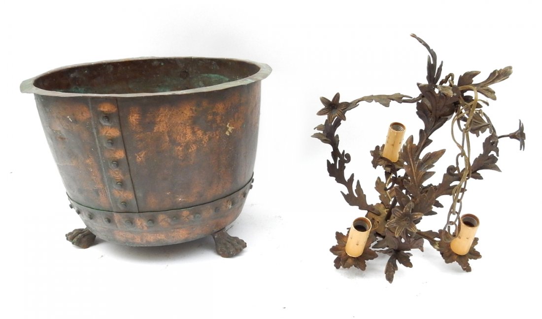 Copper and Iron Group: Includes 19th century American copper pot with paw feet together with a leaf-form fixture. [Pot: 13" H x 19" W].