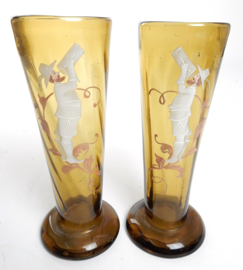Pair of Bohemian Enameled Glass Beakers: Pair of Bohemian enameled amber glass beakers, 19th century. [7" H].