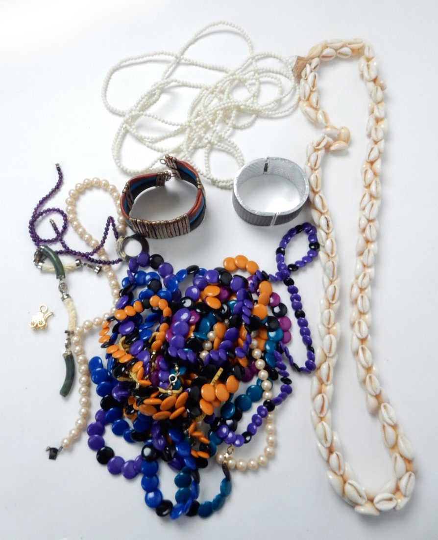 Assorted Costume Jewelry: Including seashell necklaces, bracelets and miscellaneous.