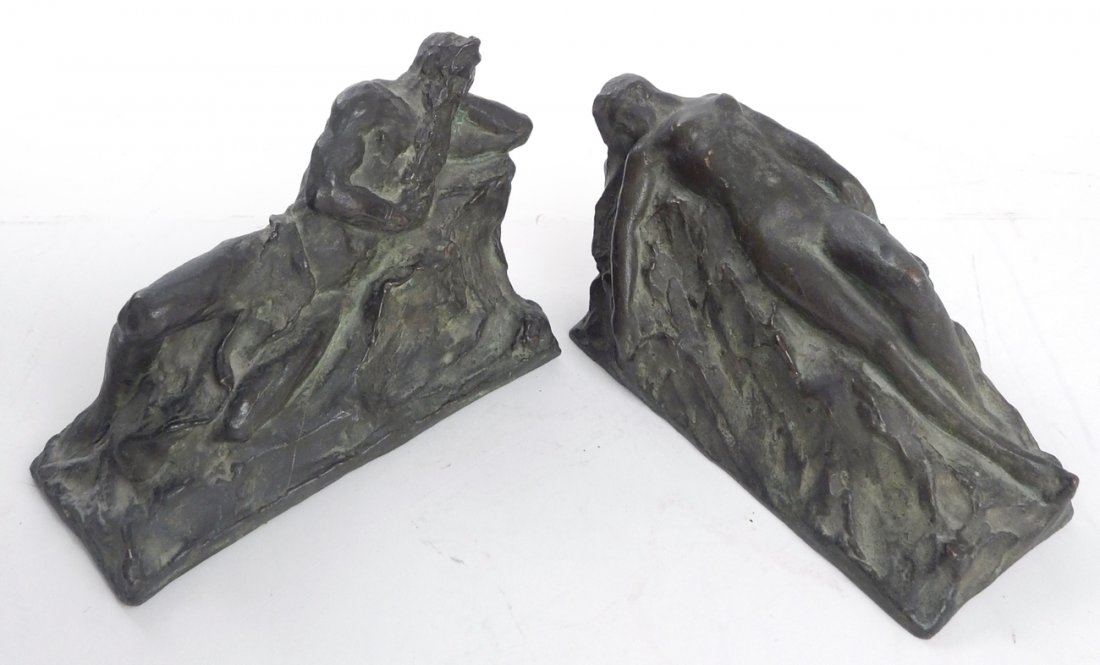 G.F. Boyle, Pair of Bookends: Pair of sculptural bookends of reclined nude male and female figures. Signed. [Approx 10" L x 5 " H].