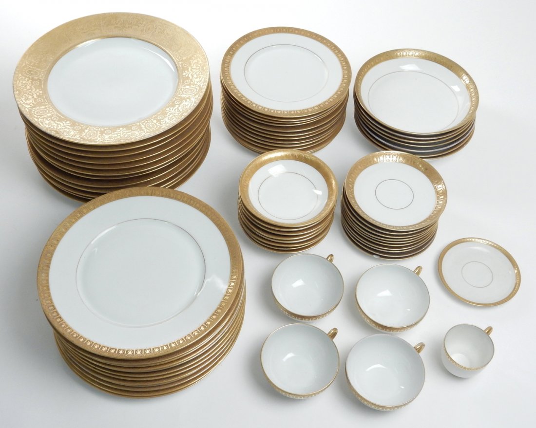 Bavarian "Wedding Band" Dinner Set: Partial gold and white "wedding band" pattern dinner service. 60+ pieces. Various conditions.