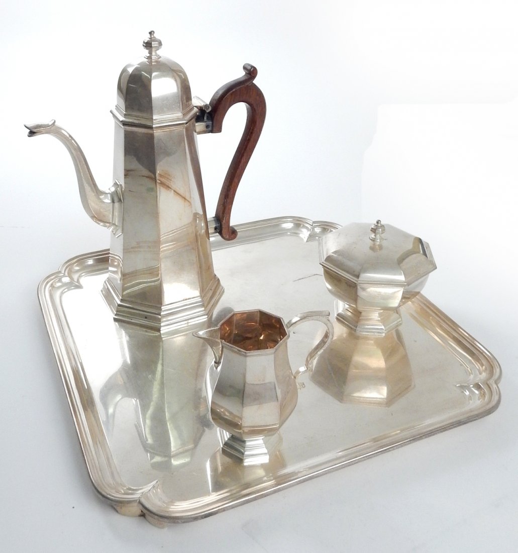 Sterling Silver Tea Service: Assembled George I - style tea service. Comprises: 1.) Shrubsole tray. [14 1/8" Sq]. 2.) Reproduction John Newtown dome-top teapot with wood handle. [10 1/2" H]. 3.) Shrubsole sugar bowl with lid. 4.)