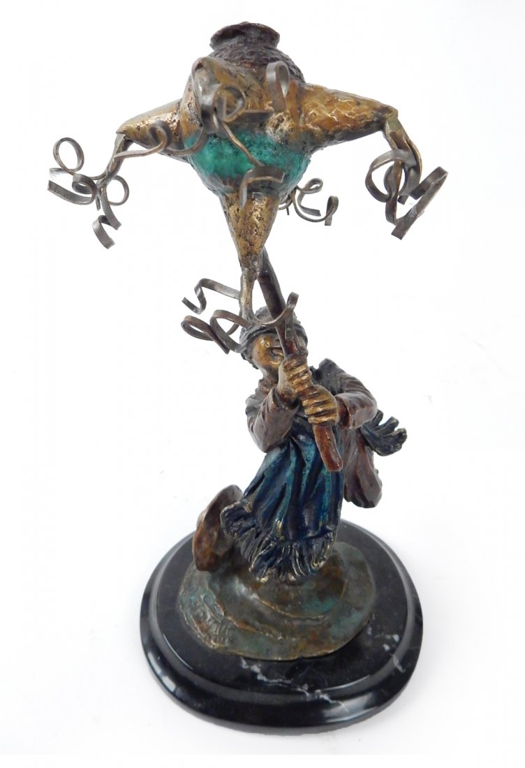Bronze Sculpture, Boy and Pinata: Bronze sculpture, boy with pinata on marble base. Signed illegibly. [10 1/2" H x 5 1/2" x 4 5/8"]. In good condition.