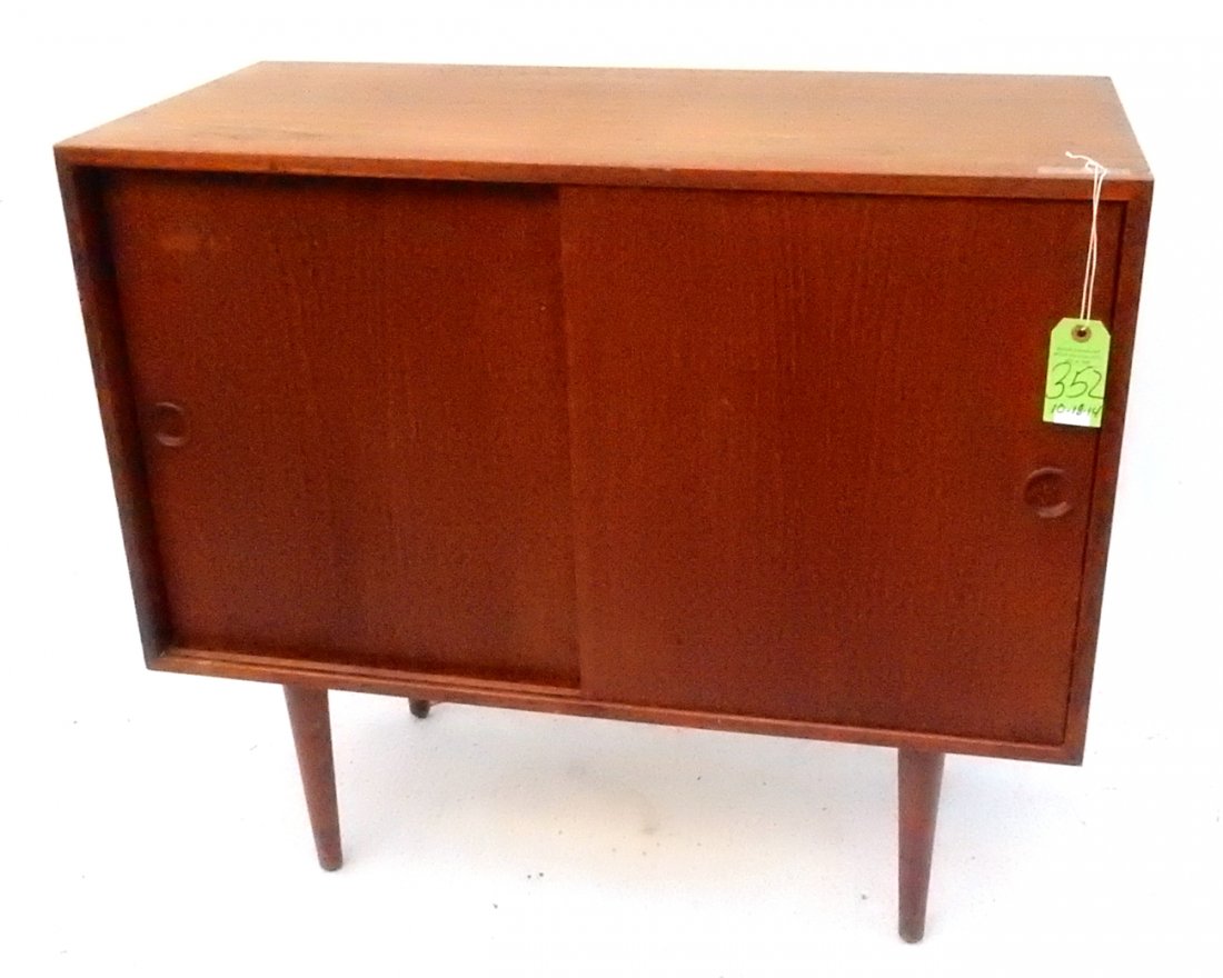 Danish Modern Server: Modern stand with two sliding doors. [33 3/4" L x 15 3/4" D x 36 1/2" H]. Stains. From Martin Parker / Spencertown Art and Antique Company.