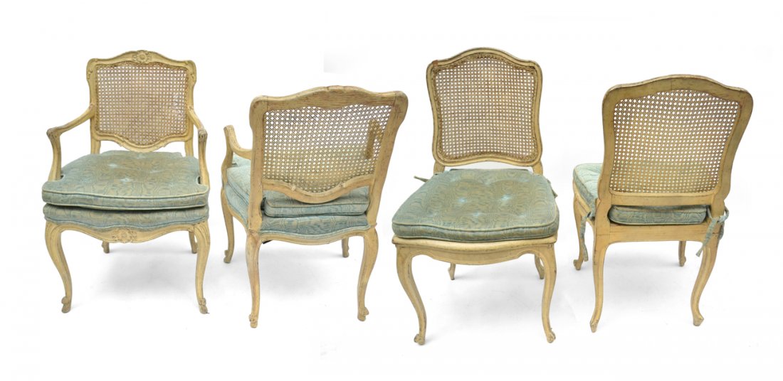 Four Louis XV-Style Caned Chairs: Comprises 2 armchairs and 2 side chairs. Armchairs have upholstered seats; side chairs have caned seats. Caning bears losses, all sold "as is".