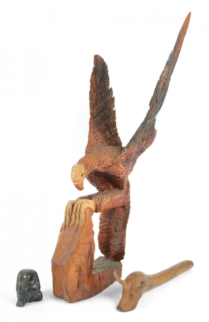 Folk Art Sculpture Lot: Comprises: 1.) Bald eagle [22" W x 17" D x 36" H]. 2.) Driftwood elephant [4 1/2" W x 4 1/8" D x 18" L]. 3.) Composition head of an ancient Egyptian [3 5/8" W x 3 1/2" D x 4 1/8" H]. Condition varies,