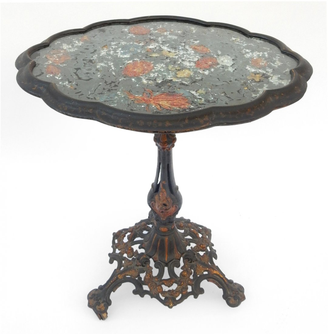 Victorian Iron Tilt Table: 19th century floral decorated tilt table on ornate base with coasters. [Tilted: 19 1/2" x 24" x 39 1/4" H; Down: 27 1/2" H]. Wear to foil.