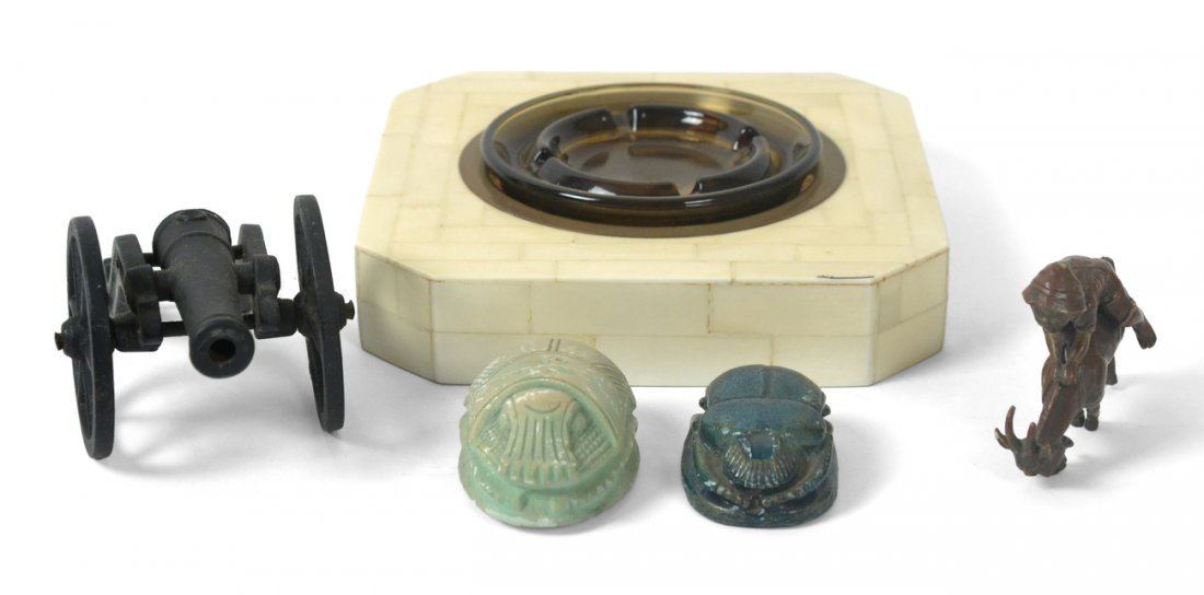 Assorted Decorative Articles: Comprises: 1.) Patinated cast brass boy riding goat (missing base: doesn't stand upright). [Together: 4" W x 1 3/8" D x 3 3/4" H]. 2.) Two large painted plaster scarabs. [3 1/4" W x 2 1/4" D x 1 1/2"