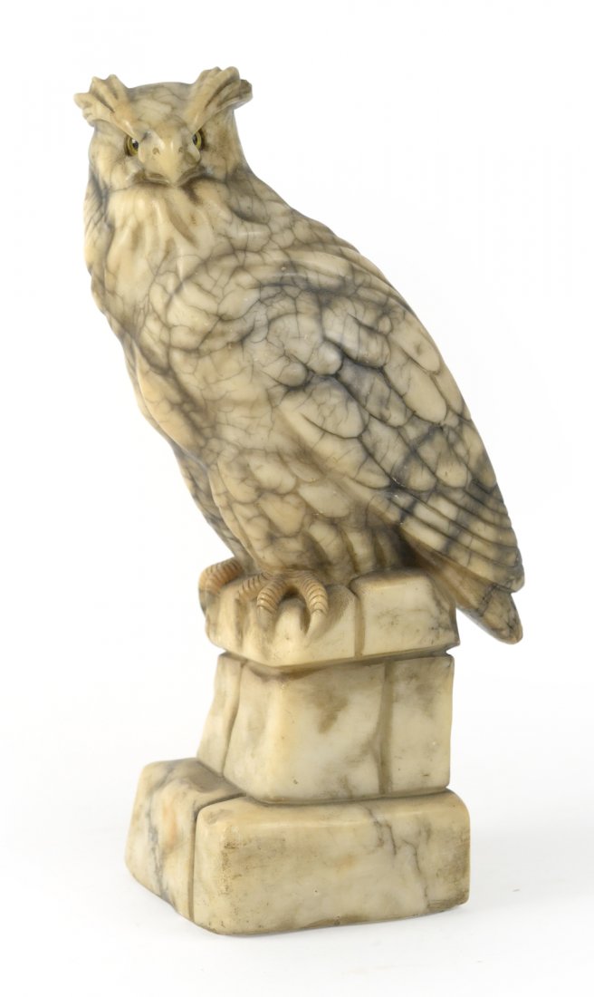 Alabaster Sculpture of an Owl: Alabaster sculpture of an owl with glass eyes. [15 1/2" H; Base: 5 1/2" x 4 1/2"]. Overall good condition; noticeable losses on left at pillar.