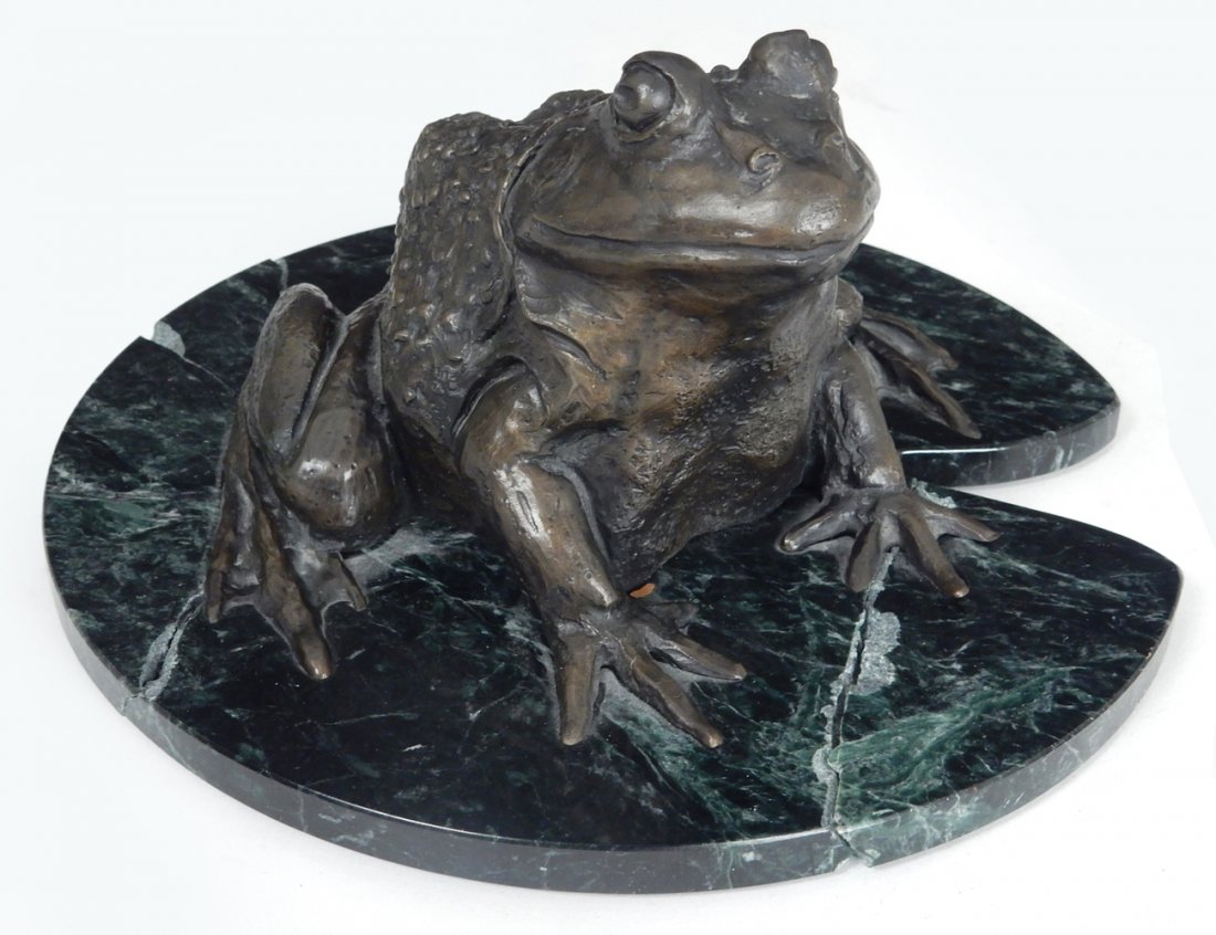 Turner, Bronze Frog on Marble Base: Signed, dated, and numbered on rear. Lily pad-shaped marble base. [7 1/2" dia x 3 1/4" H]. Break in marble base, hanging on by felt bottom.