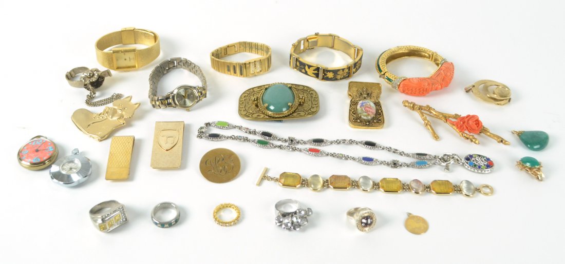 Gold and Silver -Tone Costume Jewelry: Comprises: Rings (5), ladies' wrist watches (3), pendant watches (3), pins (3), bracelets (2), money clips (2), pendants (2), bangle, buckle, earring, clips (2). Makers/designers include Kenneth Lane,