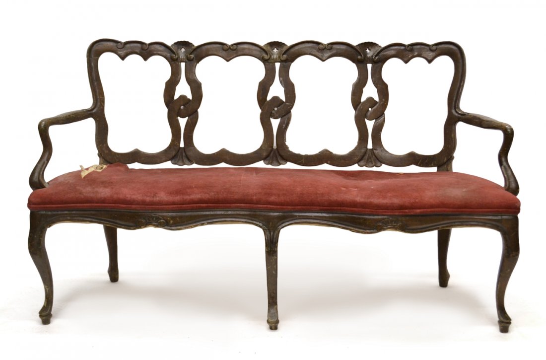 Antique French Provincial-Style Settee: Triple carved splat, five-leg, open-arm walnut settee. [59" W x 21" D x 34" H]. Scratches, scuffs, and torn upholstery.