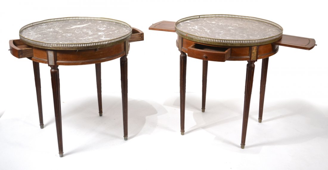 Pair Louis XVI-Style Bouillotte Tables: Pair of bouillotte tables with grey and creme marble and pierced galleries. [26" Dia x 28" H].