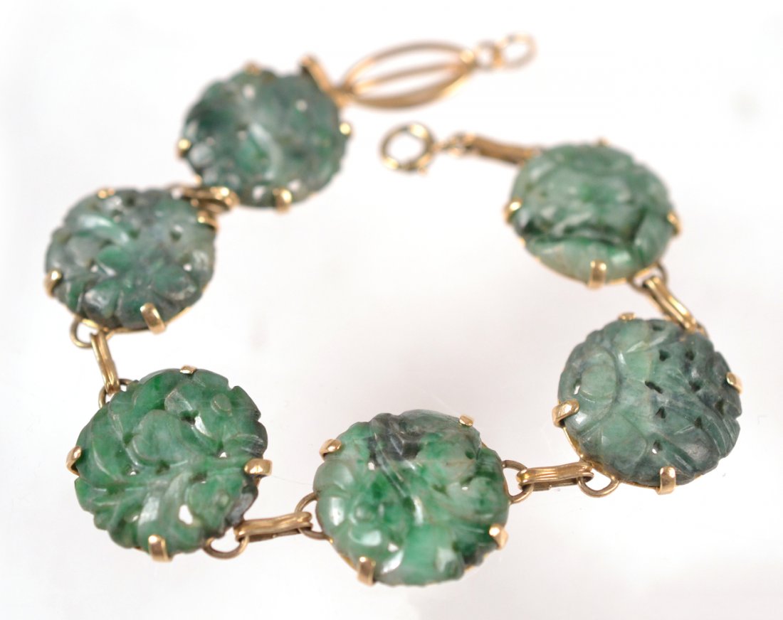 Asian 14k Chain and Jade Bracelet: Vintage 7 1/4" long bracelet with six reticulated jade discs and 14k gold chain.