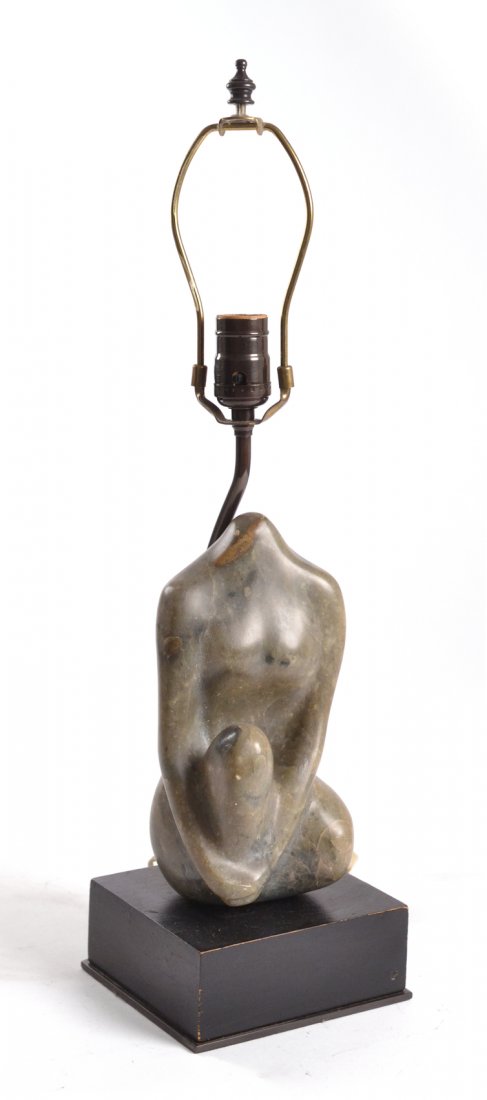 Abstract Figural Alabaster Lamp: Abstract figural alabaster lamp on a wood base.