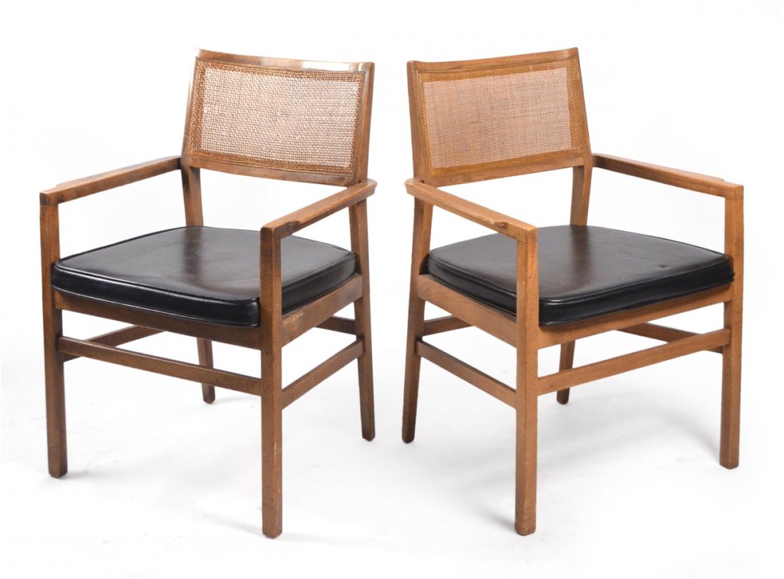 Pair of Oak and Cane-Back Armchairs: Each having black seats. [23" D x 19" W (inside arms); Back 32 1/2" H; Seat 18" H]. One with cane worn, the other replaced.