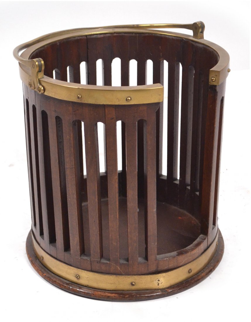 George III Mahogany Plate Rack: George III bucket form plate rack with vertical slats and brass bands. [12" Dia x 12 1/2" H].
