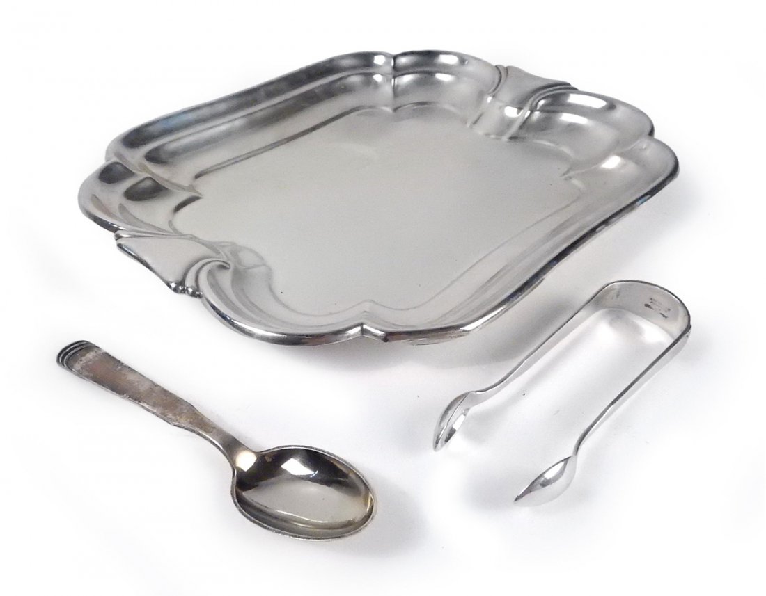 Sterling Silver Tray, H. Hansen Articles: Comprises: 1.) Tray with stepped-back scalloped edge. Stamped on bottom "International / Sterling / #H270". [10 1/4" W x 9" D x 3/4" H]. 2.) Han Hansen teaspoon [5 5/8" L] and tongs [4 1/4" L] in the