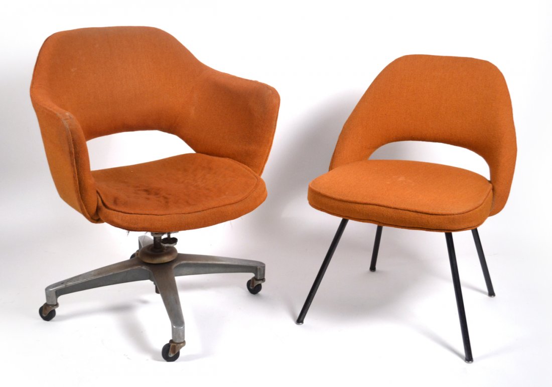 Two Knoll Chairs: Two rust upholstered chairs by Knoll. One swivels on casters; the other is stationary. One good. One worn.