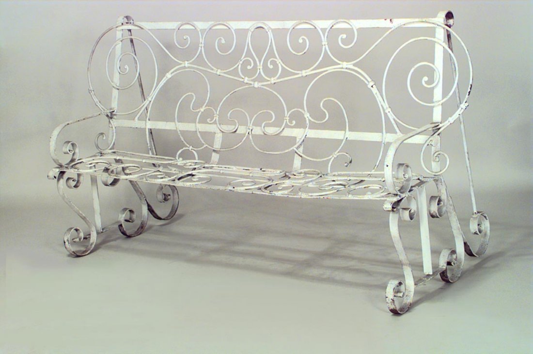 Outdoor Victorian Painted Iron Settee: Outdoor Victorian painted iron settee with scroll design seat, back, and arms. [69" W x 32" D x 37" H].