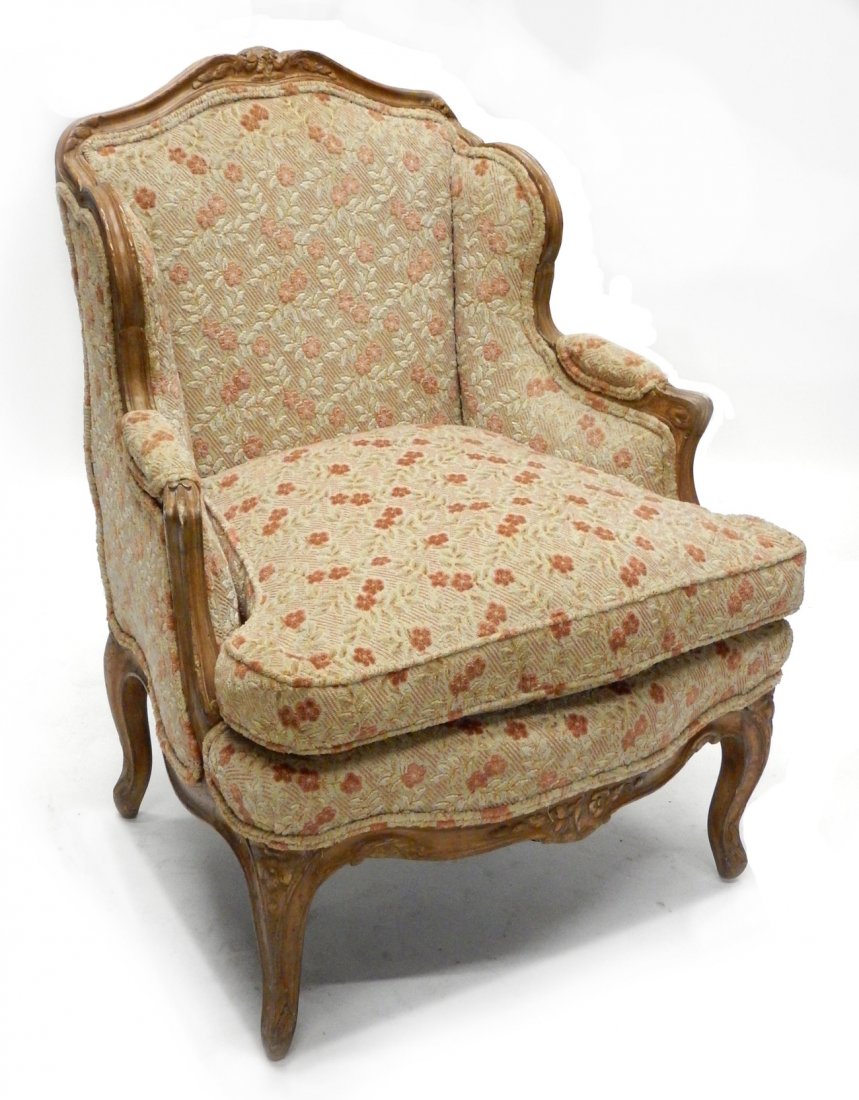 Louis XV Style Bergere Chair: Louis XV style bergere chair carved pecan. [27 1/2" W x 21" D x 34 3/4" H]. Good condition.