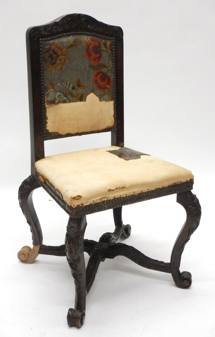 Italian Antique Carved Walnut Chair: Italian carved walnut char, cabriole legs with scroll feet. Remnants of original hand painted leather upholstery. [22" W x 21" D x 40" H]. Repairs, "as is".