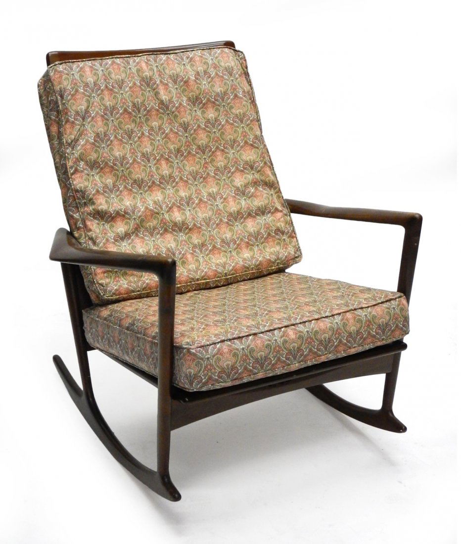 Ib Kofod-Larson Rocking Chair: Mid-century Ib Kofod-Larson rocking chair. Denmark 1960s beech with walnut stain/ upholstery. Original Selig Label. [32" W x 30" D x 34 1/2" H]. Good condition. Wear to finish.