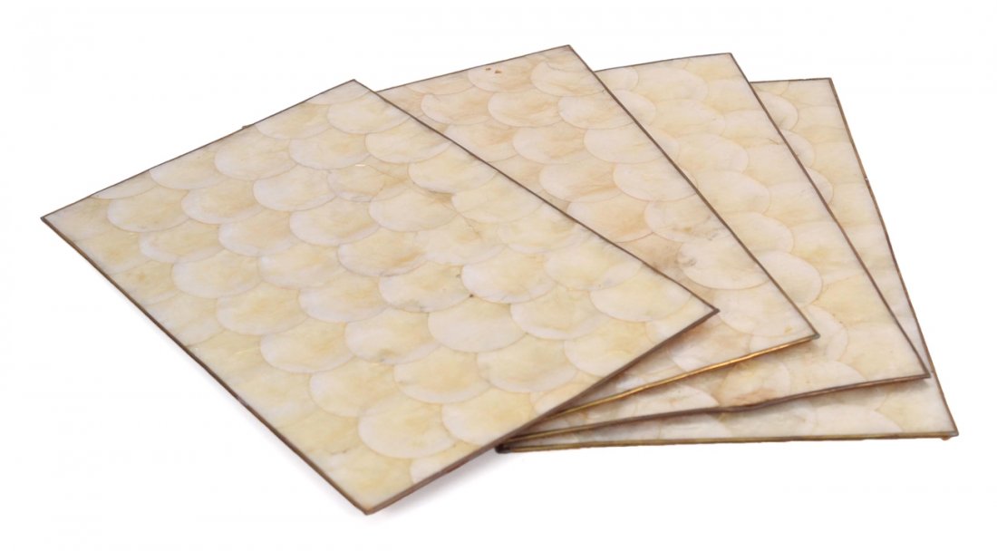 Set of 4 Mid-Century Capiz Placemats: Vintage capiz shell placemats with cork backing and brass surrounds. [Each: 12" x 18"]. Some wear.
