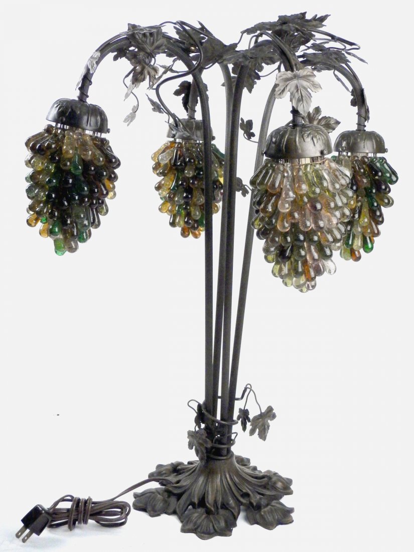 Signed Italian Grape Form Lamp: 20th century romantic style leaf motif and stand with four arching shafts and multicolor glass grape form shades. Signed on base. [18" Dia x 24" H]. Untested.