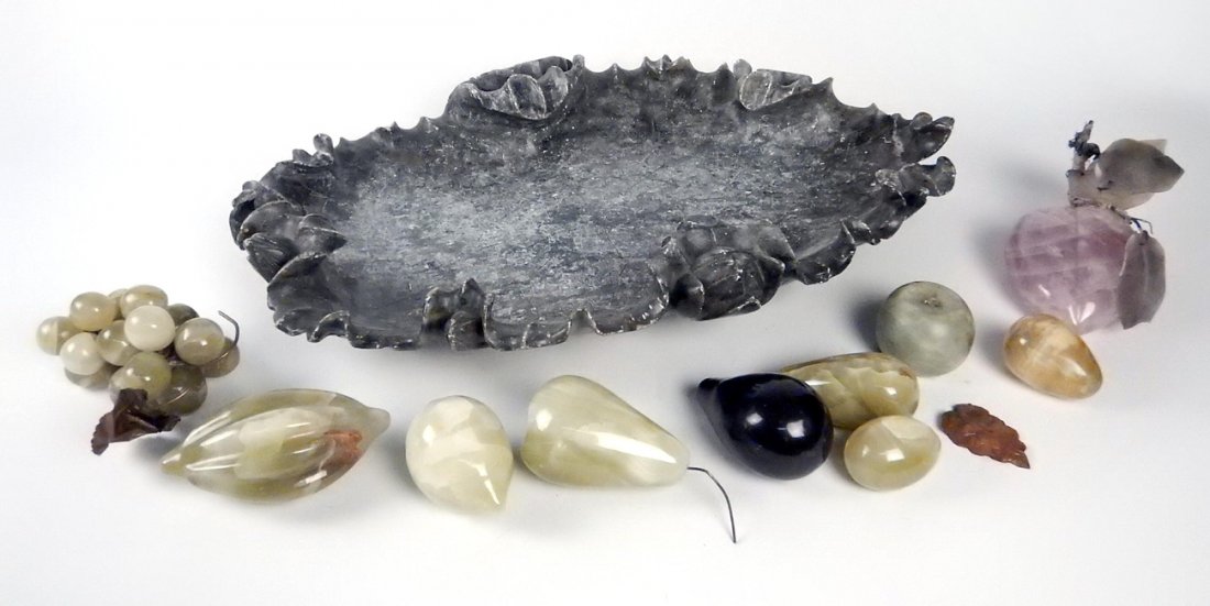 Carved Soapstone Platter with Fruit: Carved soapstone platter with leaf and lotus motif with 10 hardstone fruits. [21 1/2" L x 15" W x 4" H]. Repairs and losses.