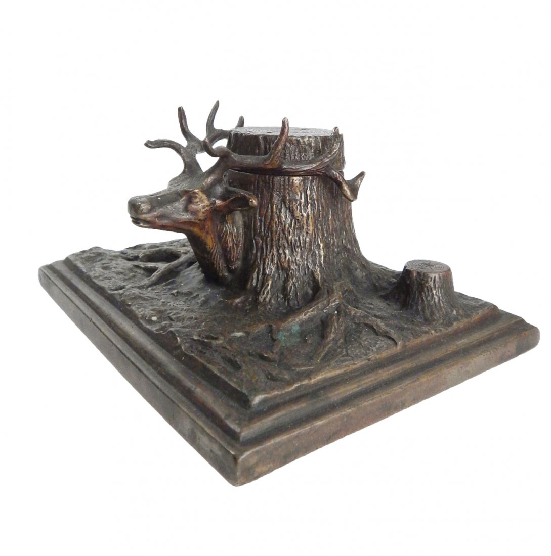 Bronze Inkwell, Tree Trunk & Deer Head: Bronze inkwell tree trunk with deer head and antlers. [4 1/2" W x 5 5/8" D x 3" H]. Good condition, missing glass insert.