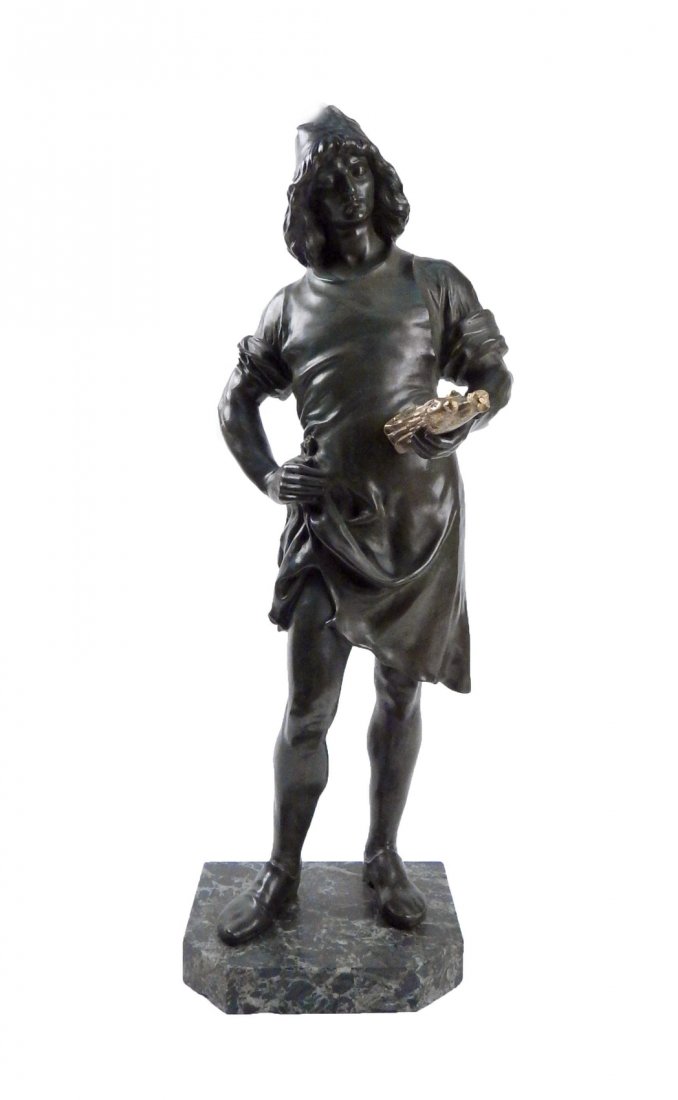 Bronze Florentine Male Figure: Bronze Florentine standing male figure holding gilded statue of Virgin and Child. On green marble base. [10 " W x 10" D x 25" H]. Good condition.