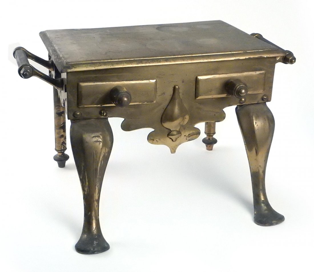 Brass Trivet: Brass trivet with two handles. [21 1/2" L x 14 1/4" W x 12" H]. Good condition.